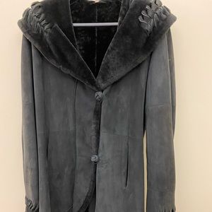 Black shearling 3/4 length coat by Christia